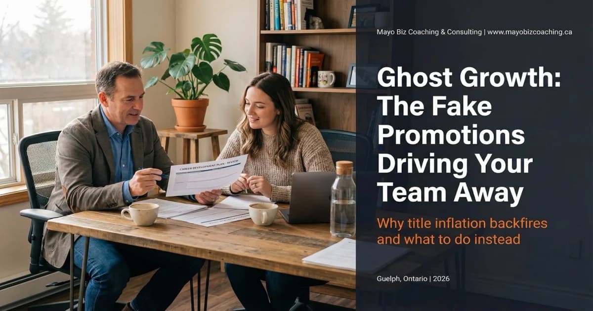 Business owner reviewing a team member promotion plan with honest career growth paths on a whiteboard