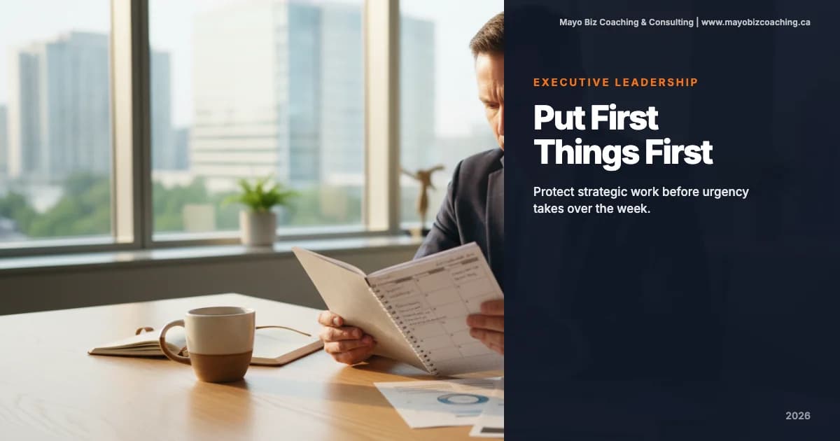 Business leader reviewing weekly priorities and protecting strategic time on a paper planner in a calm office setting
